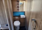 2022 Auto-Trail Tracker RB motorhome interior view of the toilet and handbasin.