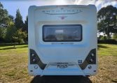 Rear view of the 2022 Auto-Trail Tracker RL motorhome displaying overall back profile and exterior details.