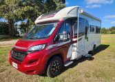 Exterior profile of the 2022 Auto-Trail Tracker RL motorhome showing side view, windows, and overall design layout.