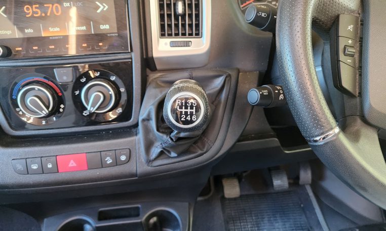 6-speed manual gearbox in a 2022 Auto-Trail Tracker RL motorhome cab, smooth gear shifts, ergonomic shifter, designed for reliable touring performance.
