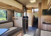 TV mounted inside a 2022 Auto-Trail Tracker RL motorhome living area.