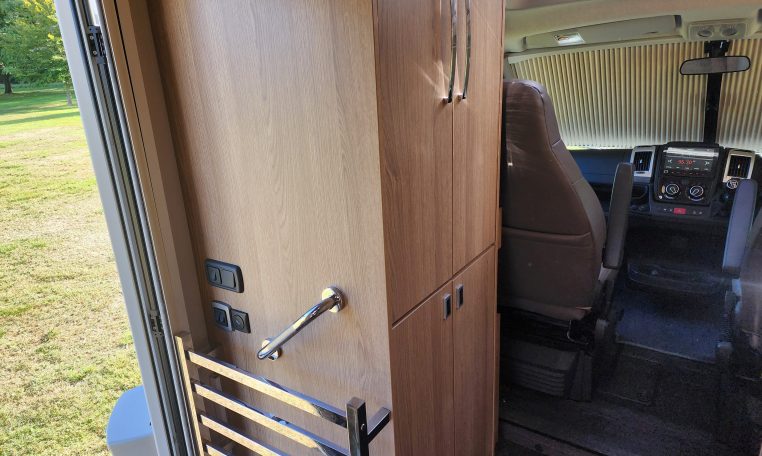 Wall mounted towel rail in 2022 Auto-Trail Tracker RL motorhome, compact and practical design, keeps towels dry, and within easy reach.
