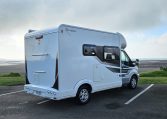 2022 Auto-Trail F-Line F-60 exterior showing the rear and driver's side.
