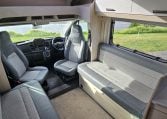 2022 Auto-Trail F-Line F-60 interior showing the spacious front lounge.