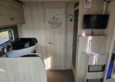 2022 Auto-Trail F-Line F-60 interior showing the kitchen overhead storage.