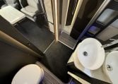 2022 Ci Magis 66XT interior view showing the spacious bathroom area.