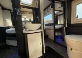 2022 Ci Magis 66XT interior view showing the hand basin in the bathroom.