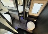 2022 Ci Magis 66XT interior view showing the toilet in the bathroom.