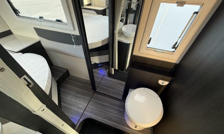 2022 Ci Magis 66XT interior view showing the toilet in the bathroom.