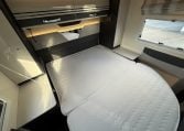 2022 Ci Magis 66XT interior view showing the spacious bedroom.