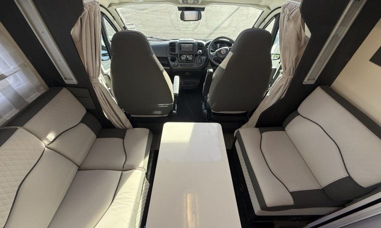 2022 Ci Magis 66XT interior view showing the comfortable cab seats.