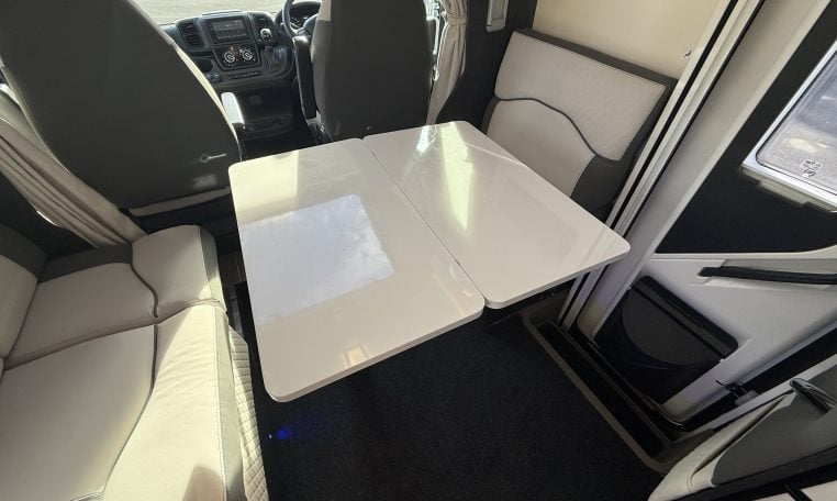 2022 Ci Magis 66XT interior view showing the dinette table.