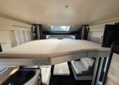 2022 Ci Magis 66XT interior view showing the drop-down bed.