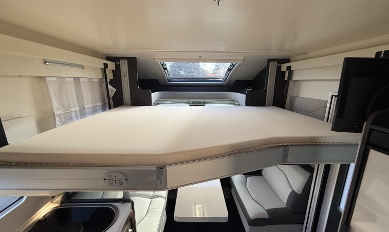 2022 Ci Magis 66XT interior view showing the drop-down bed.