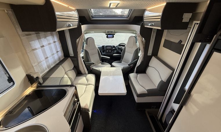 2022 Ci Magis 66XT interior view of the spacious front dining area.