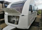 2023 Adria Altea Dart caravan exterior view with a gas bottle in the locker.