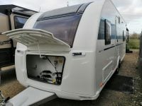 2023 Adria Altea Dart caravan exterior view with a gas bottle in the locker.