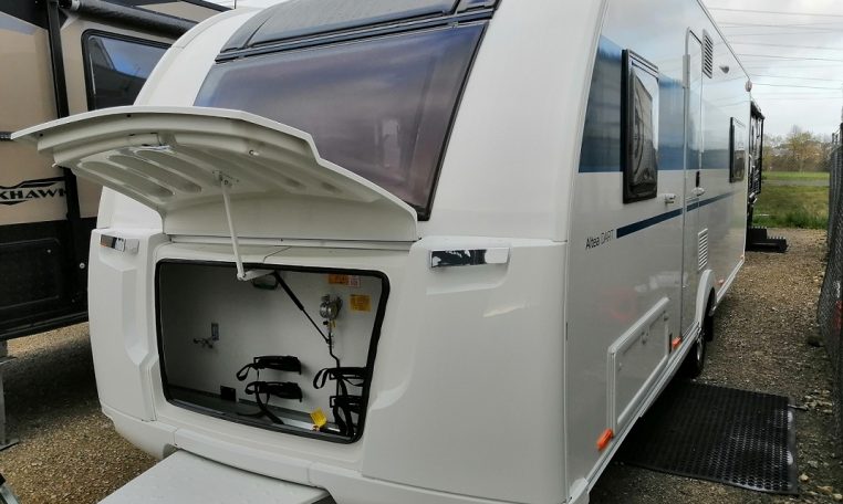 2023 Adria Altea Dart caravan exterior view with a gas bottle in the locker.