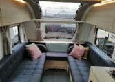 2023 Adria Altea Dart caravan interior view with spacious front lounge.