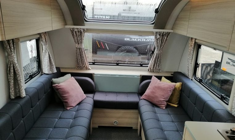 2023 Adria Altea Dart caravan interior view with spacious front lounge.