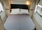 2023 Adria Altea Dart caravan interior view with rear island bed.