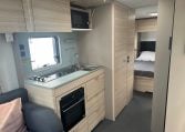 2023 Adria Altea Dart caravan interior view with built-in oven.