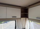2023 Auto-Trail F72 4-berth motorhome interior view showing the cabinetry in the rear lounge.