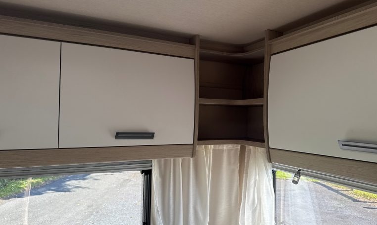 2023 Auto-Trail F72 4-berth motorhome interior view showing the cabinetry in the rear lounge.
