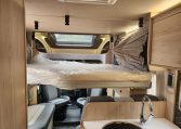 2023 Auto-Trail F72 4-berth motorhome interior view showing the electric drop-down bed.