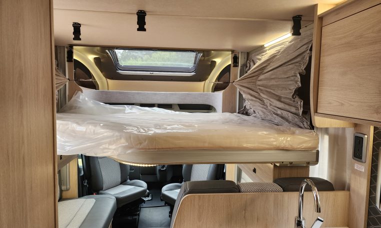 2023 Auto-Trail F72 4-berth motorhome interior view showing the electric drop-down bed.
