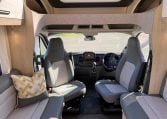 2023 Auto-Trail F74 interior view showing the front captain swivel chairs.