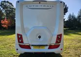 2023 Auto-Trail Frontier Comanche exterior view showing the rear side of the motorhome.