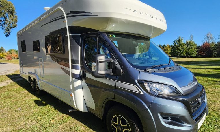 2023 Auto-Trail Frontier Comanche exterior view showing the driver's side and front of the motorhome.