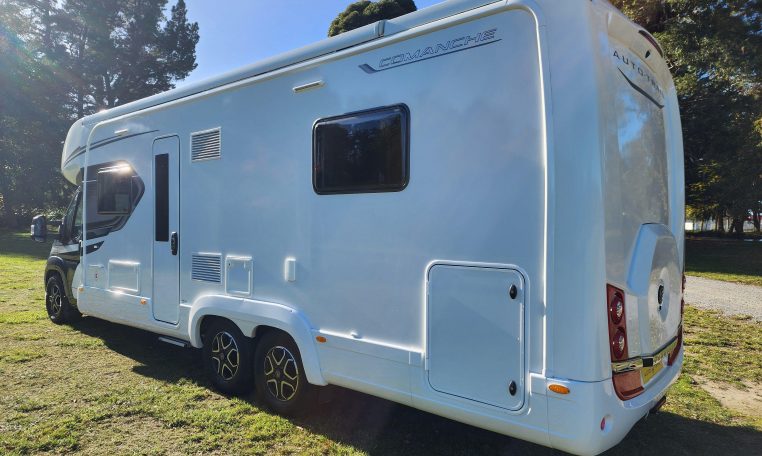 2023 Auto-Trail Frontier Comanche exterior view showing the habitation door and side of motorhome.
