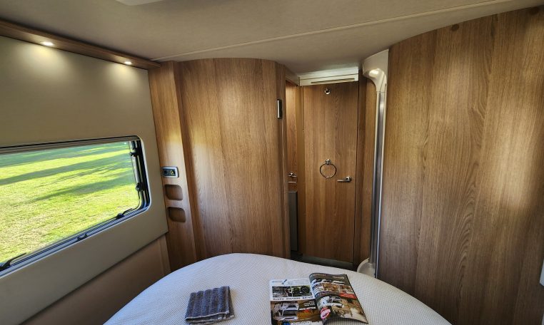 2023 Auto-Trail Frontier Comanche interior view showing the bedroom closed off from the living area.