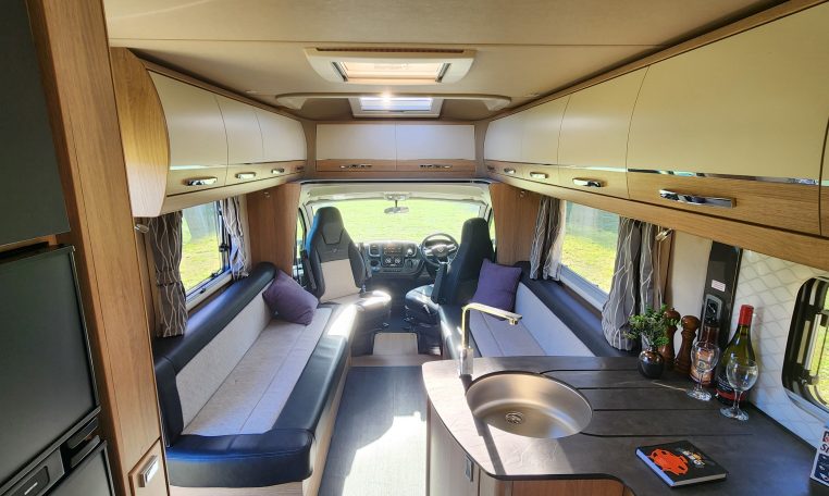 2023 Auto-Trail Frontier Comanche interior view of the overhead storage in the front lounge.