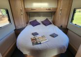 2023 Auto-Trail Frontier Comanche interior view showing the fixed rear island bed.