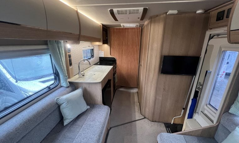 2023 Auto-Trail Imala 730 motorhome interior view showing the privacy door closing off the bedroom.
