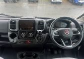 2023 Auto-Trail Imala 730 motorhome interior view showing the steering wheel and dash in the cab.