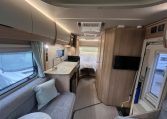 2023 Auto-Trail Imala 730 motorhome interior view showing the TV in the living room.