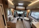 2023 Auto-Trail Imala 730 motorhome interior view showing the spacious front lounge.