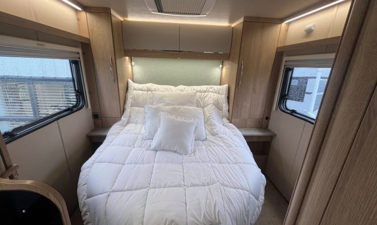 2023 Auto-Trail Imala 730 motorhome interior view showing the spacious bedroom setup with the rear island bed.