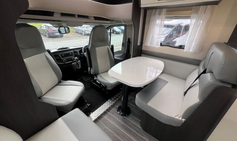2023 Roller Team Zefiro 696 motorhome interior view showing the cab swivel seats.