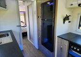 2023 Titan Blackhawk 720 Tardis interior view showing the built-in fridge.