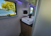 2023 Titan Blackhawk 720 Tardis caravan interior view showing the bathroom handbasin.