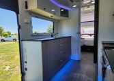 2023 Titan Blackhawk 720 Tardis caravan interior view showing the spacious kitchen.