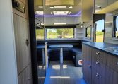 2023 Titan Blackhawk 720 Tardis caravan interior view showing the kitchen storage.