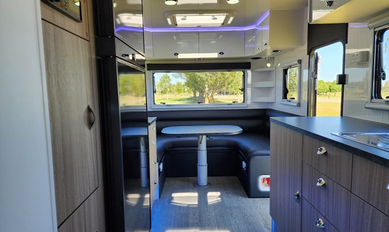 2023 Titan Blackhawk 720 Tardis caravan interior view showing the kitchen storage.