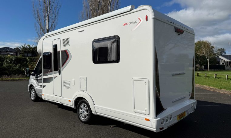 Auto-Trail F74 motorhome exterior view showing the rear and passenger side.