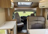 2023 Roller Team Auto-Roller 747 motorhome interior view showing the front cab swivel seats.